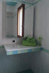 Ein Badezimmer in der Unterkunft B&B DA CHIARA SEA SIGHT