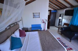Postel nebo postele na pokoji v ubytování Blu Brezza Marine Hotel