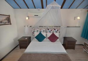 Postel nebo postele na pokoji v ubytování Blu Brezza Marine Hotel