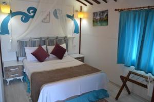 Postel nebo postele na pokoji v ubytování Blu Brezza Marine Hotel