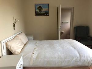 Letto o letti in una camera di Lahinch View