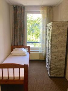 Postel nebo postele na pokoji v ubytování Harbour Hub Hostel