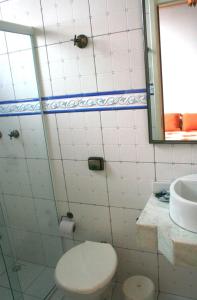 a bathroom with a toilet and a sink at Pousada Solar Nossa Senhora Das Merces in Ouro Preto