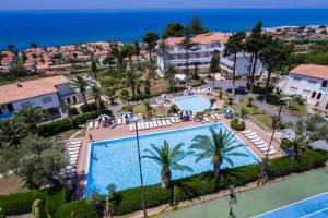 an aerial view of a swimming pool at a resort at Hotel La Castellana in Belvedere Marittimo