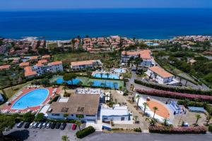 an aerial view of a resort with a swimming pool at Hotel La Castellana in Belvedere Marittimo