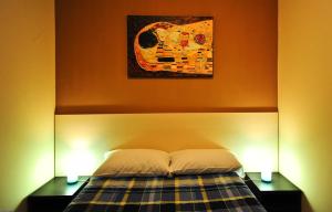 Postel nebo postele na pokoji v ubytování Hotel Mosaic Central Rome