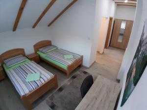 Katil atau katil-katil dalam bilik di Bedrooms Cerovac