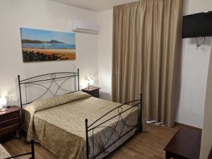 Postel nebo postele na pokoji v ubytování B&B Castiglione