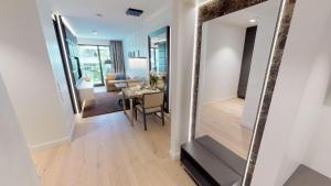 Postel nebo postele na pokoji v ubytování White Pearl Apartment 1.15