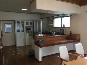Guesthouse ENN的厨房或小厨房