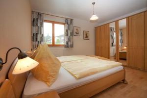 Postel nebo postele na pokoji v ubytování Landhaus Scherling