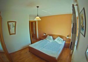 Postel nebo postele na pokoji v ubytování Landhaus Scherling