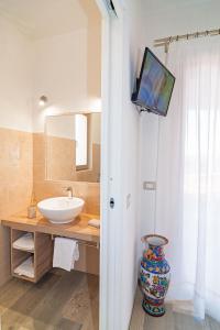 Gallery image of MOLAROTTO CAMERE CON ANGOLO COTTURA in San Teodoro