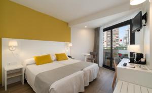 Postel nebo postele na pokoji v ubytování Medplaya Hotel Rio Park + 37 fotografií