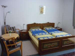 Ένα ή περισσότερα κρεβάτια σε δωμάτιο στο Hotel Hecker Braunlage