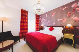 Postel nebo postele na pokoji v ubytování Derby Apart Hotel