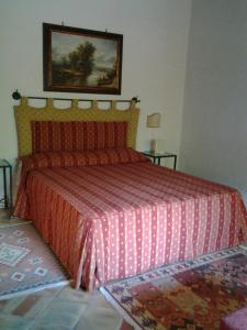 En eller flere senge i et værelse på Crapa Licca