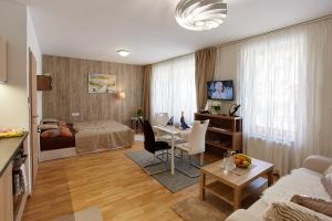 TV a/nebo společenská místnost v ubytování Apartmany Arber