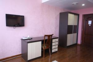 TV a/nebo společenská místnost v ubytování Vanatur Hotel