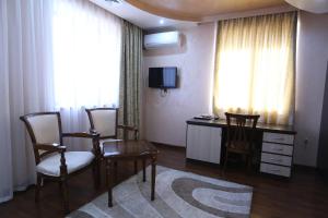 TV a/nebo společenská místnost v ubytování Vanatur Hotel