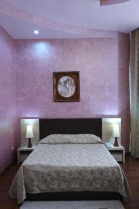 Postel nebo postele na pokoji v ubytování Vanatur Hotel