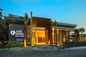 a building with a sign that reads arts hotel at Arts Hotel Bodrum Yalikavak in Yalıkavak