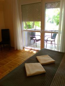 Posedenie v ubytovaní Zöld Sziget Apartmanlakás
