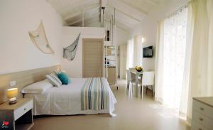 A bed or beds in a room at Agriturismo La dimora dei Re