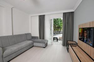 TV a/nebo společenská místnost v ubytování Club Sema Suite Hotel