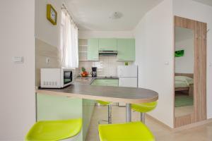 Kuchyň nebo kuchyňský kout v ubytování Apartments Ivan 813