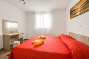 Postel nebo postele na pokoji v ubytování Apartments Ivan 813