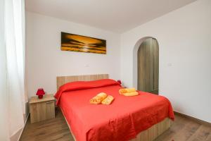 Postel nebo postele na pokoji v ubytování Apartments Ivan 813