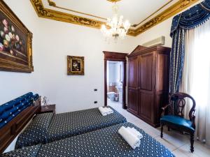 Postel nebo postele na pokoji v ubytování Euro Hotel Iglesias