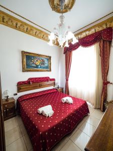 Postel nebo postele na pokoji v ubytování Euro Hotel Iglesias