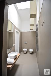 Koupelna v ubytování Corte Cairoli B&B and Suites