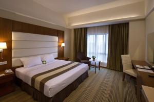 Postel nebo postele na pokoji v ubytování Pearl View Hotel Prai, Penang