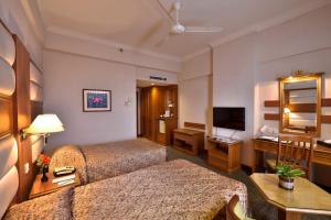 Postel nebo postele na pokoji v ubytování Pearl View Hotel Prai, Penang