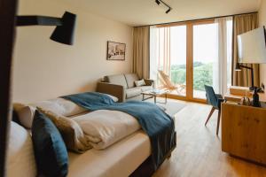 Postel nebo postele na pokoji v ubytování Ratscher Landhaus
