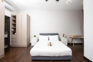 Katil atau katil-katil dalam bilik di Velocity KL By PSM Luxury Suites