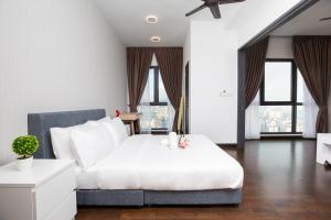 Katil atau katil-katil dalam bilik di Velocity KL By PSM Luxury Suites