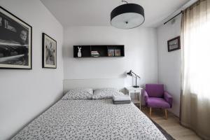 Postel nebo postele na pokoji v ubytování Apartament LAVENDER