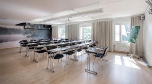 a large room with tables and chairs in it at Original Sokos Hotel Vaakuna Hämeenlinna in Hämeenlinna +36 photos