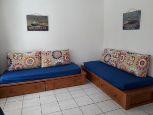 A seating area at Moliets Plage Appartement pour 4 Piscine proche Plage et Commerces