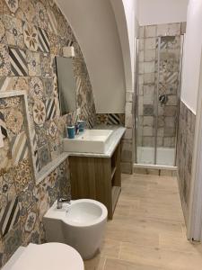 Phòng tắm tại Maison Arena Al Corso +38 ảnh