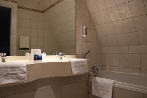 Koupelna v ubytování Hotel Eden