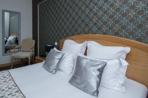 Postel nebo postele na pokoji v ubytování Hotel Eden