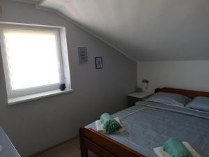 Postel nebo postele na pokoji v ubytování S. A. L. Prenociste