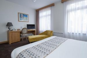Postel nebo postele na pokoji v ubytování Hotel Eden