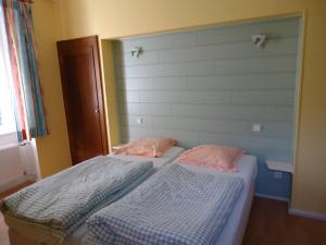 Postel nebo postele na pokoji v ubytování Hostellerie de la Vallée