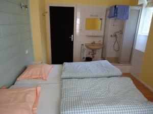Postel nebo postele na pokoji v ubytování Hostellerie de la Vallée